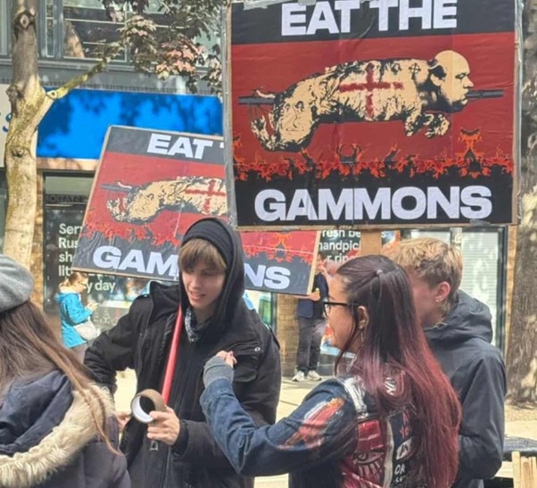 Shared with me later by a friend of mine: these signs were also professionally manufactured.