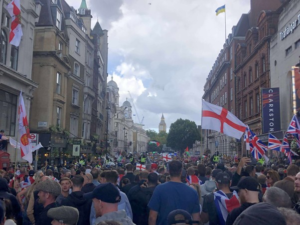 The crowd, followed by the line of equestrian police, followed by Stand Up to Racism (1).