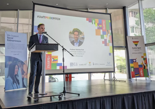 Then newly minted Vice-Principal & Dean, Professor Nicholas Rule speaking at the 2023 ICUBE Pride Pitch event, where competing teams that do not field at least one 2SLGBTQIA+ individual are excluded from a chance to win $10,000 in cash prizes.